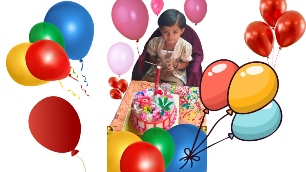 दोन वर्षांच्या छोट्या मुलीचा वाढदिवस साजरा करताना केकसमोर बसलेली गोड मुलगी आणि आजूबाजूला रंगीबेरंगी फुगे.